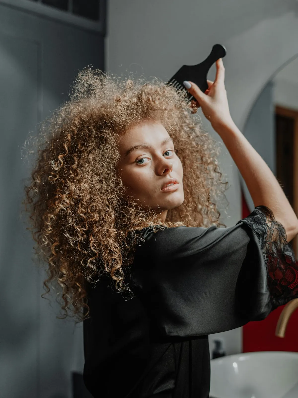 Corte de cabelo afro e cacheado feito no Studio T Black, em São José dos Campos